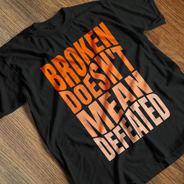 Camiseta Broken Doesn’t Mean Defeated  (Subido por el creador)