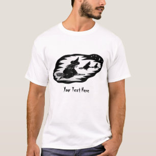 Camiseta brujas fantasmagóricas del vuelo en los palos de