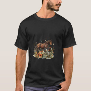 Camiseta Caballo en prado de flores con mariposas