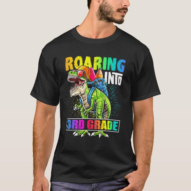 Camiseta Camino hacia la mochila de dinosaurios de tercer g (Anverso)