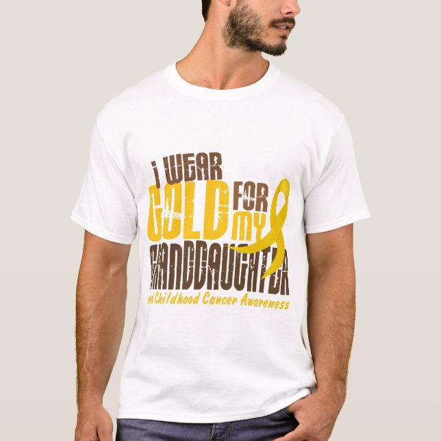 Camiseta Cáncer de la niñez LLEVO el ORO PARA MI NIETA (Anverso)