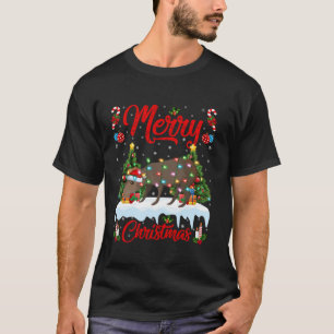 Camiseta Capybara Merry Árbol de Navidad iluminando Santa C