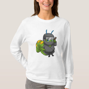 Camiseta Caterpillar como Ninja con espada