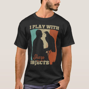 Camiseta Caza de Falconería que juego con objetos agudos pa