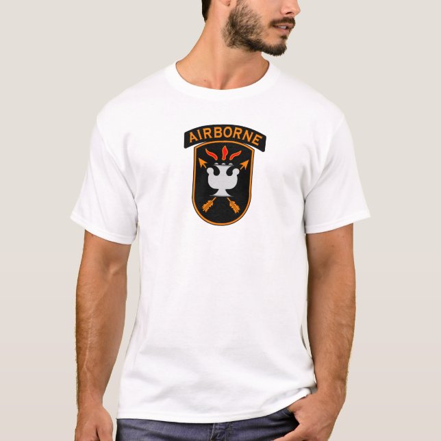 CAMISETA CENTRO ESPECIAL DE LA GUERRA DE JFK (Anverso)
