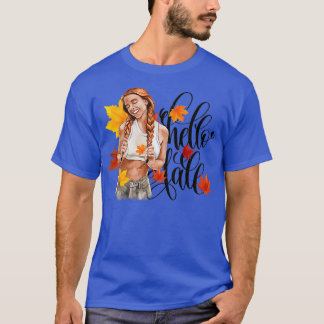 Camiseta Chica de moda de la cabeza roja en hojas de otoño