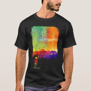 Camiseta Chica pinta una foto de Safari en la pared con ele