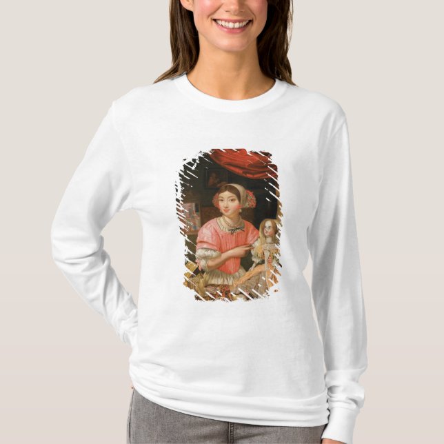 Camiseta Chica que sostiene una muñeca en un interior (Anverso)