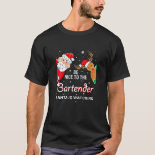 Camiseta Christmas Be Nice To The Bartender Santa Is Watchi