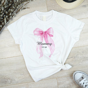 Camiseta Cinta de lazo rosa Mamá por venir