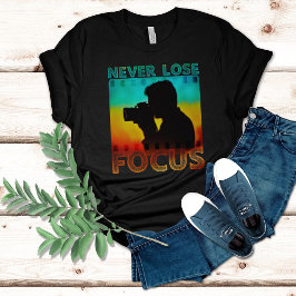 Camiseta Cita motivacional de fotógrafo nunca pierde el foc