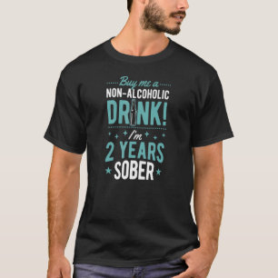 Camiseta Cómprame una bebida sin alcohol, llevo 2 años sobr