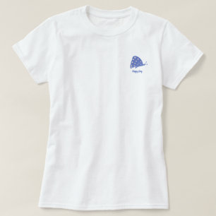 Camiseta con pequeña mariposa azul minimalista