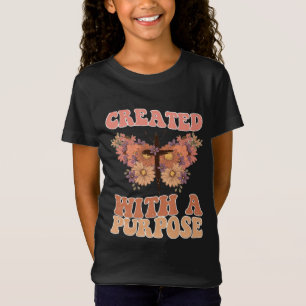 Camiseta Creado con un propósito: mariposa y floral cruzada