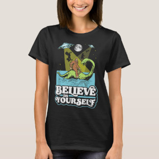 Camiseta Créanlo en su gracioso pez gordo Nessie UFO Alien