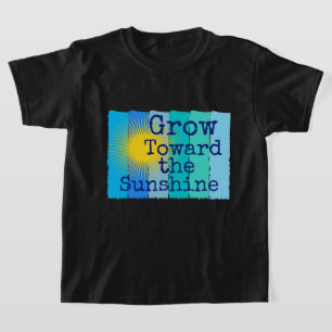 Camiseta Crece hacia la luz del sol.