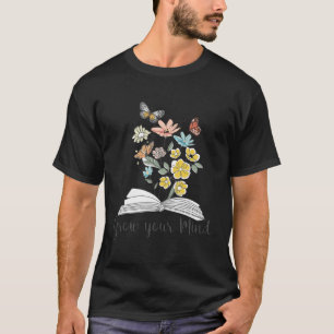 Camiseta Crece tu mente libro de flores silvestres leyendo