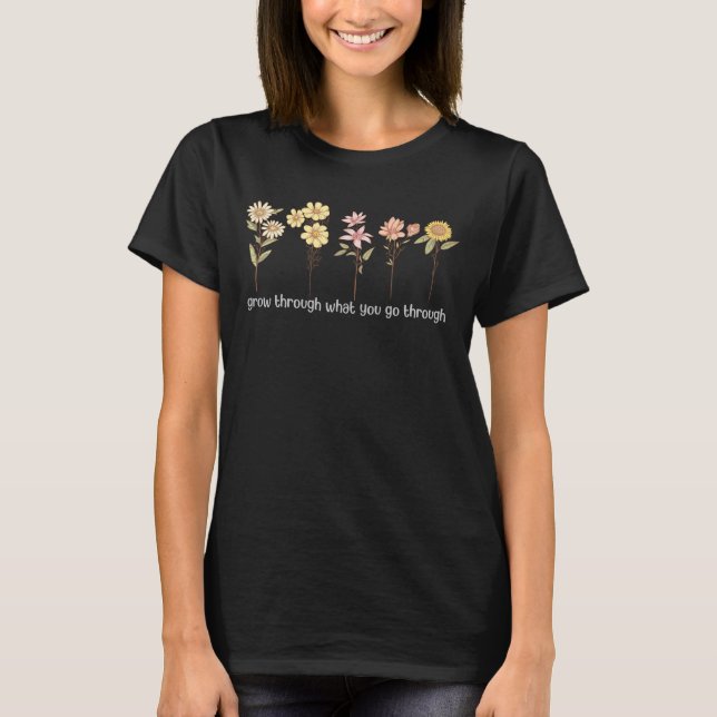 Camiseta Crecer por lo que pasas, Flor silvestre (Anverso)