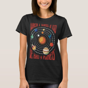 Camiseta Cuando era niño teníamos 9 planetas espaciales