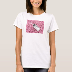 Camiseta Cuchara de metal sobre caramelos rosados