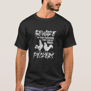 Camiseta Cuidado con las gallinas, pueden ser verdaderos pi