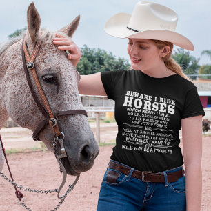 Camiseta Cuidado con viajar en caballos Humor divertido de 