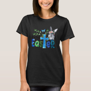 Camiseta Cuidar mi primera cruz de conejito de Pascua Feliz