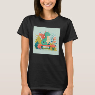 Camiseta Cute Dragón Verde sentado en un banco en un jardín
