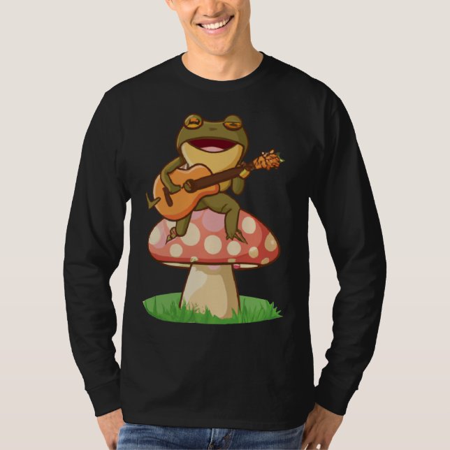 Camiseta Cute Japanese frog playing guitar banjo on a mushr (Anverso)