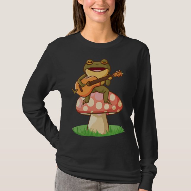 Camiseta Cute Japanese frog playing guitar banjo on a mushr (Anverso)