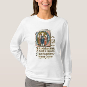 Camiseta 'D' inicial historiada que representa a un sacerdo