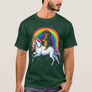 Camiseta Dachshund montando unicornio arcoiris para mujeres