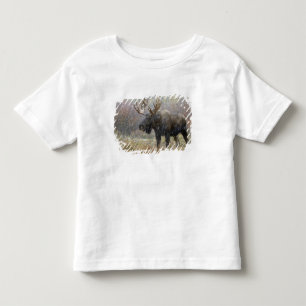 Camiseta De Bebé Alce macho en tormenta de nieve con árboles de ála