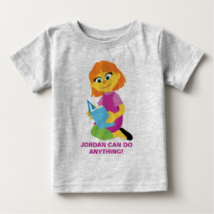 Camiseta De Bebé Barrio Sésamo Julia leyendo un libro