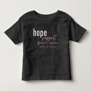 Camiseta De Bebé Cáncer de mama. Nombre del equipo personalizado. C