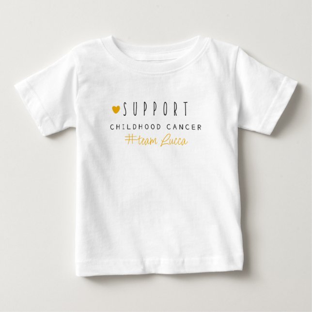 Camiseta De Bebé cáncer infantil. Nombre del equipo personalizado.  (Anverso)