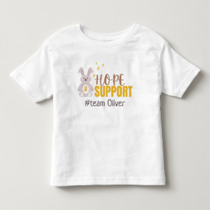 Camiseta De Bebé cáncer infantil. Personalizado #nombre de equipo T
