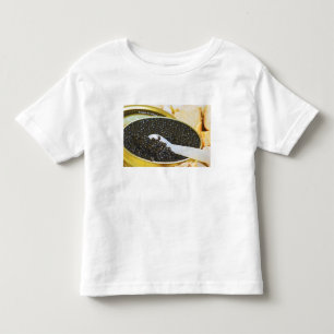 Camiseta De Bebé Caviar negro y una cuchara de nácar para