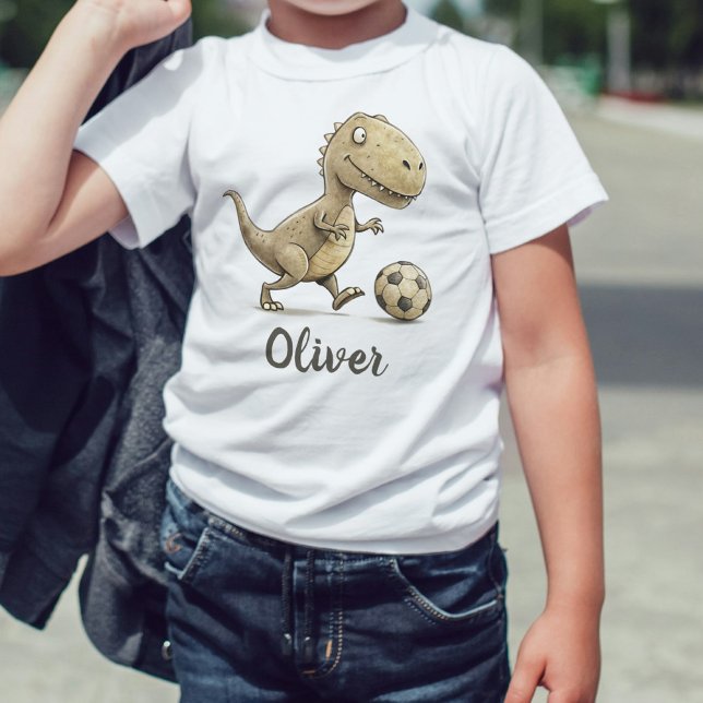 Camiseta De Bebé Cute Tiny Trex Jugando Fútbol (Subido por el creador)