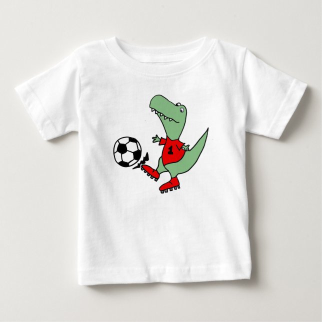 Camiseta De Bebé Dinosaurio divertido de T-rex que juega a fútbol (Anverso)
