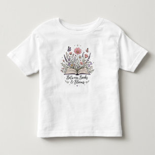 Camiseta De Bebé Entre libros y florece amante de los libros lector
