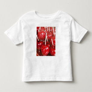 Camiseta De Bebé Fruta recubierta de caramelo en el Festival de la