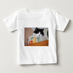 Camiseta De Bebé Gato en un bol de frutas