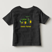 "Granjero menor" y tractor verde