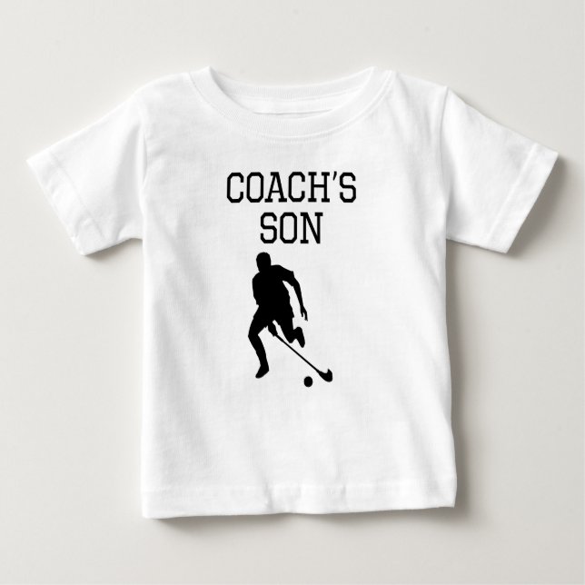 Camiseta De Bebé Hijo del entrenador de hockey sobre hierba (Anverso)