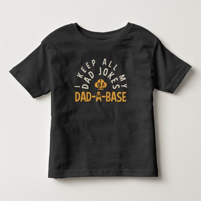 CAMISETA DE BEBÉ MANTENGO TODOS MIS CHISTES PAPÁ EN MI BASE DE PAPA (Anverso)