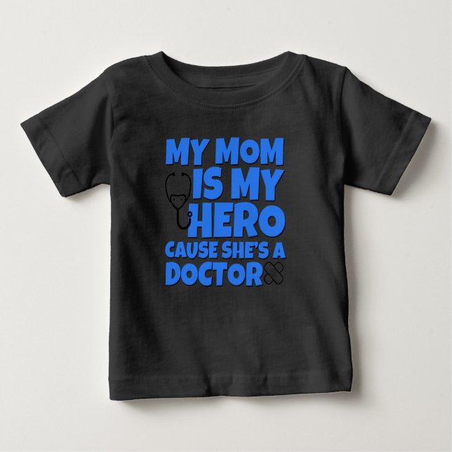 Camiseta De Bebé Mi madre es mi heroína, camiseta Médica para bebé (Anverso)