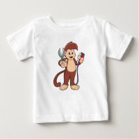 Mono como peluquero con tijeras y Razor