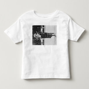 Camiseta De Bebé Mujer posteando en un equipo de tenis Fotografía