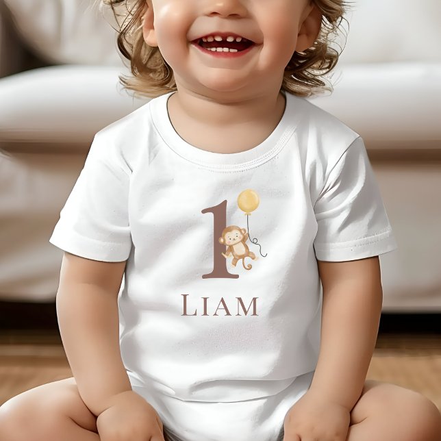 Camiseta De Bebé Número de cumpleaños del mono pequeño (Toddler wearing a white T-Shirt with the number 1 and a monkey holding a balloon.)